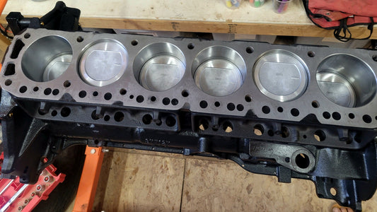 Chevy inline six rebuild NSTALLING PISTONS